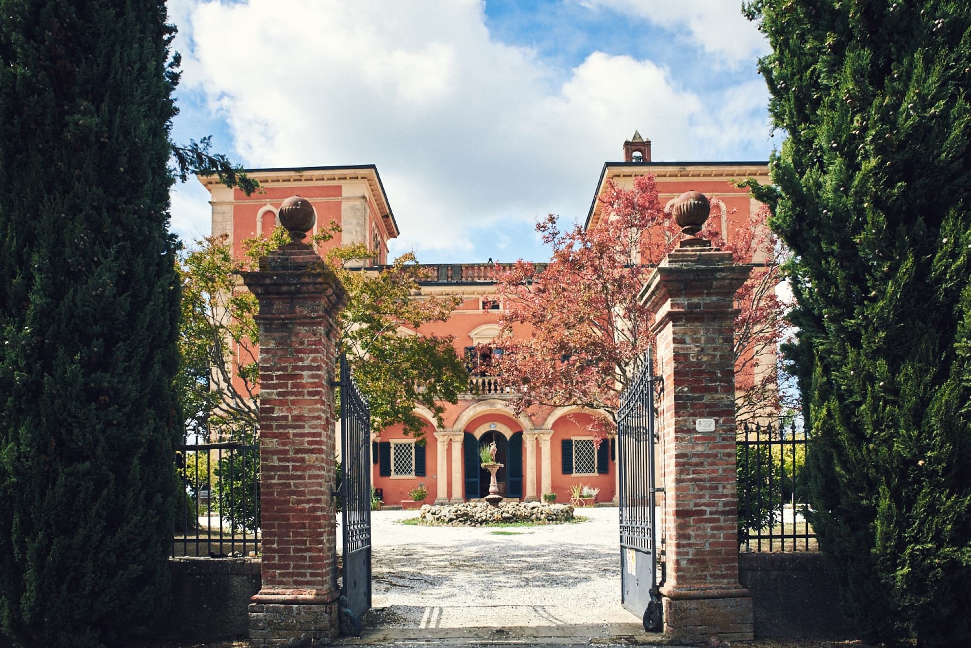 Villa Lena’s orange villa above its organic Tuscan estate