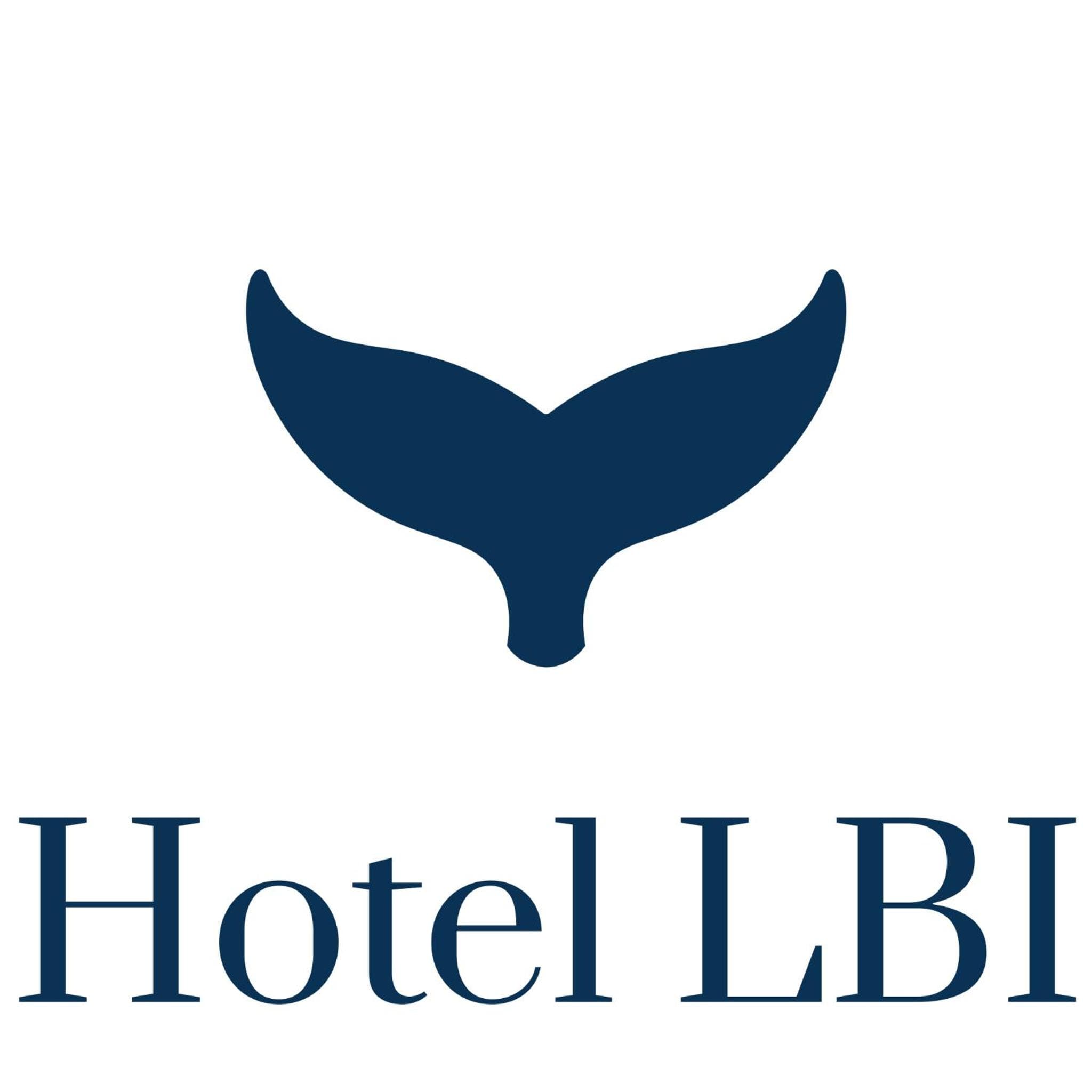 Navy blue logo featuring a whale tail above bold typography on a plain white background.
