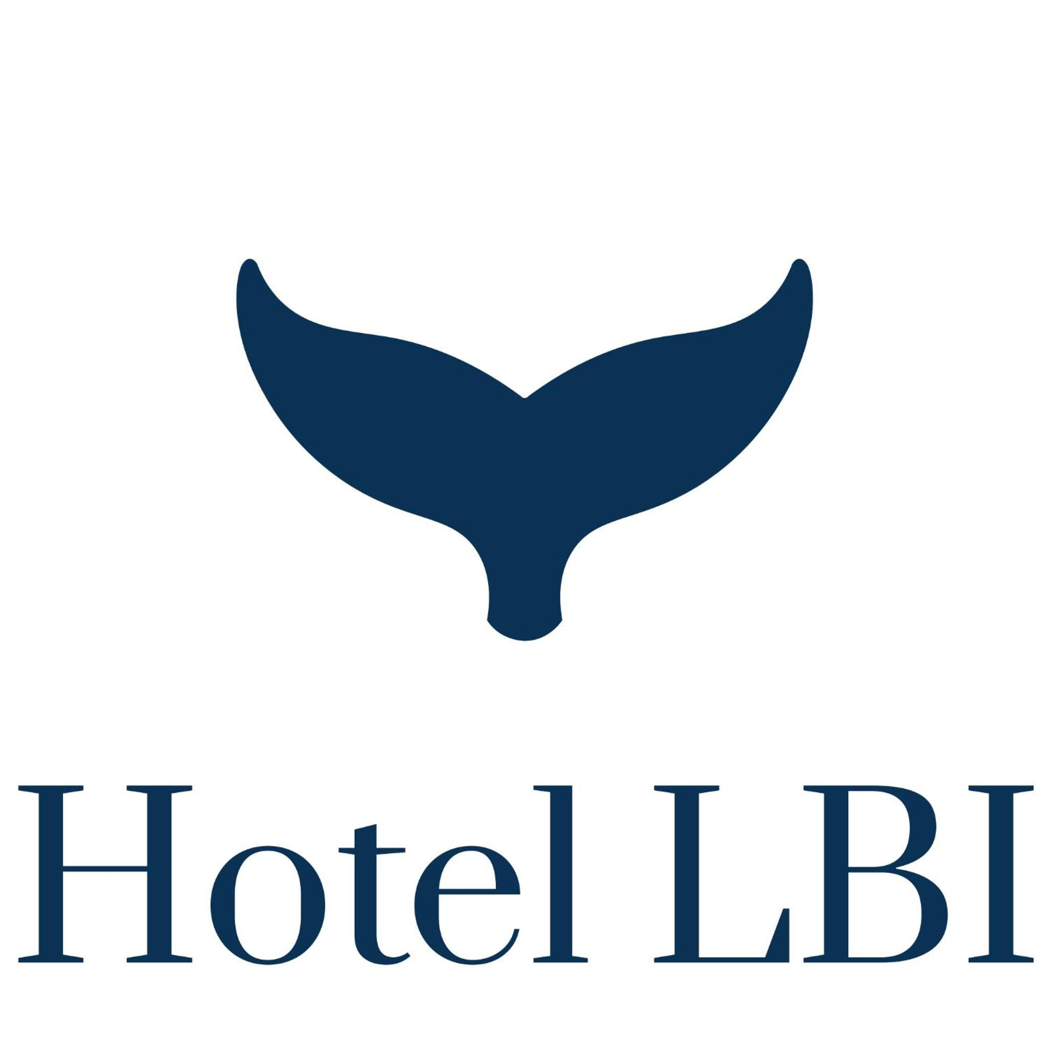 Navy blue logo featuring a whale tail above bold typography on a plain white background.