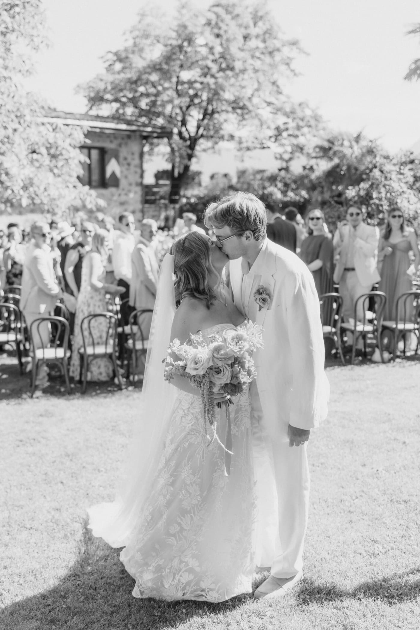Walt and Perrie share a kiss during their wedding ceremony