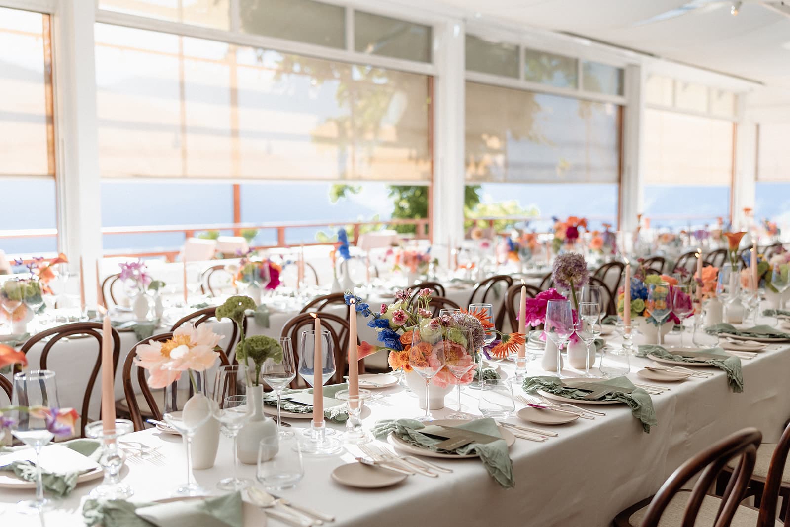 The hotel dining room set for Perrie and Walt’s wedding dinner