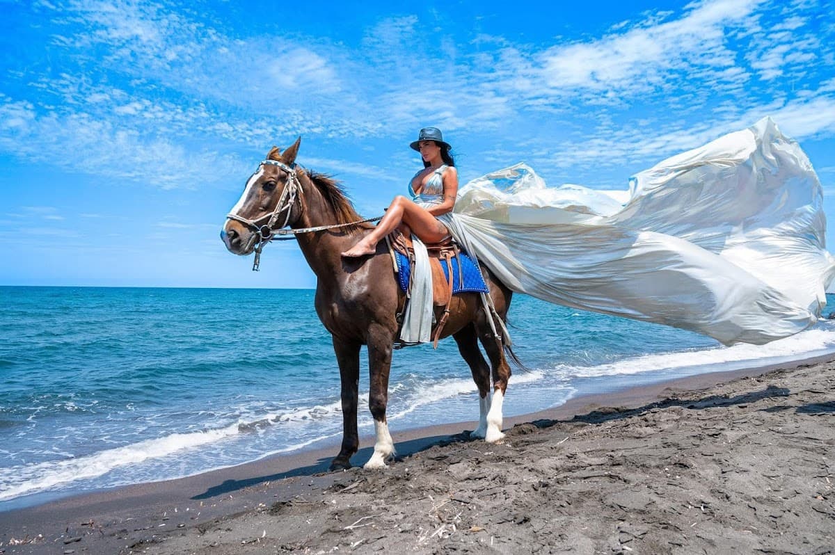 Photographer flying dress — wedding photographer in Santorini