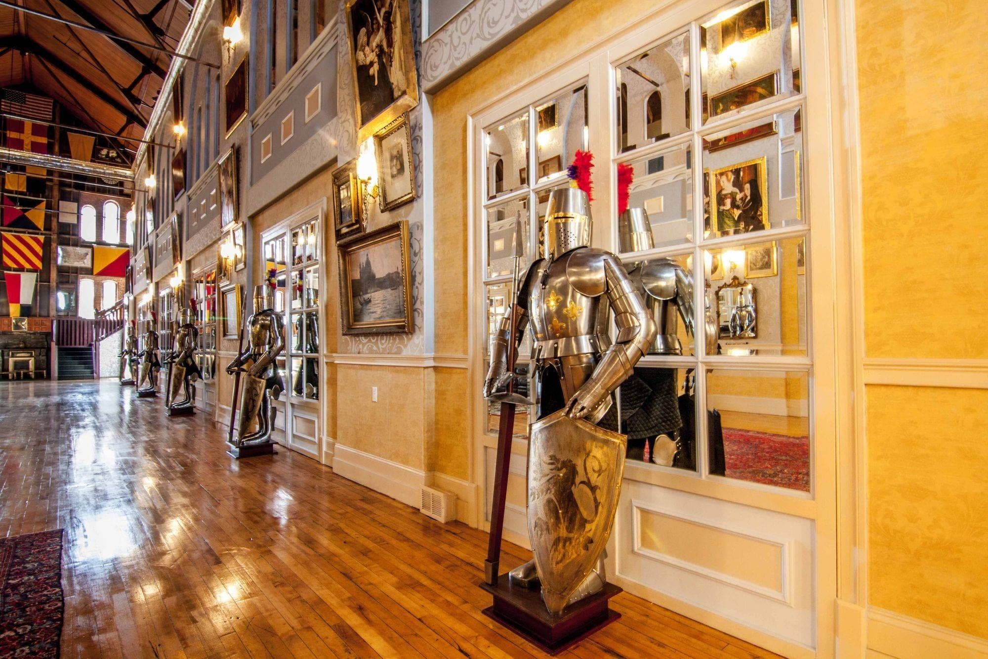 Hallway with suits of armor and flags