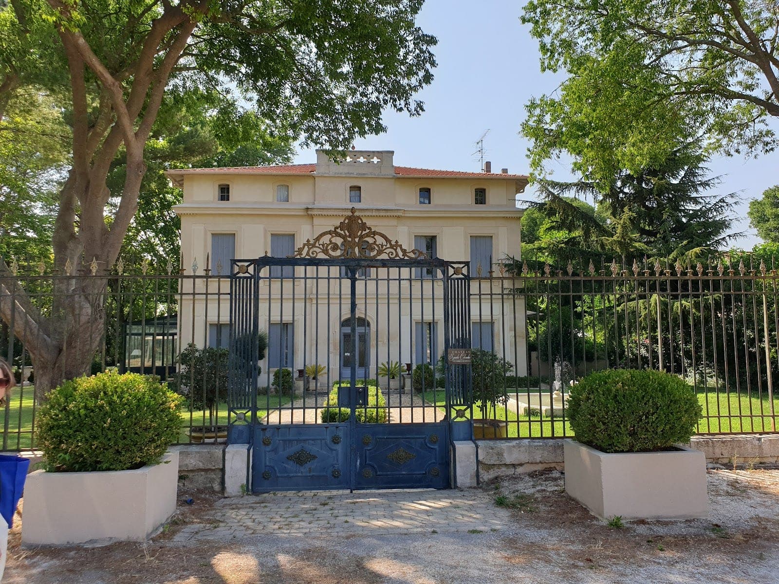 Chateau Sainte Colombe exterior with ornate gates and fence