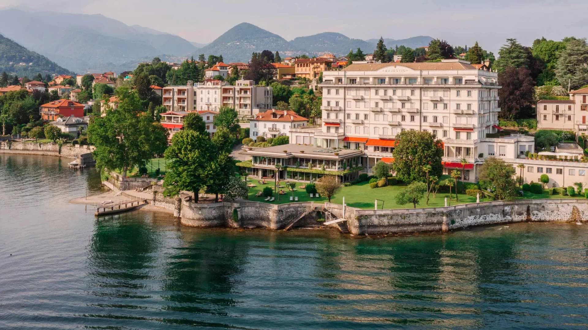 Grand Hotel Majestic exterior with lake and mountains