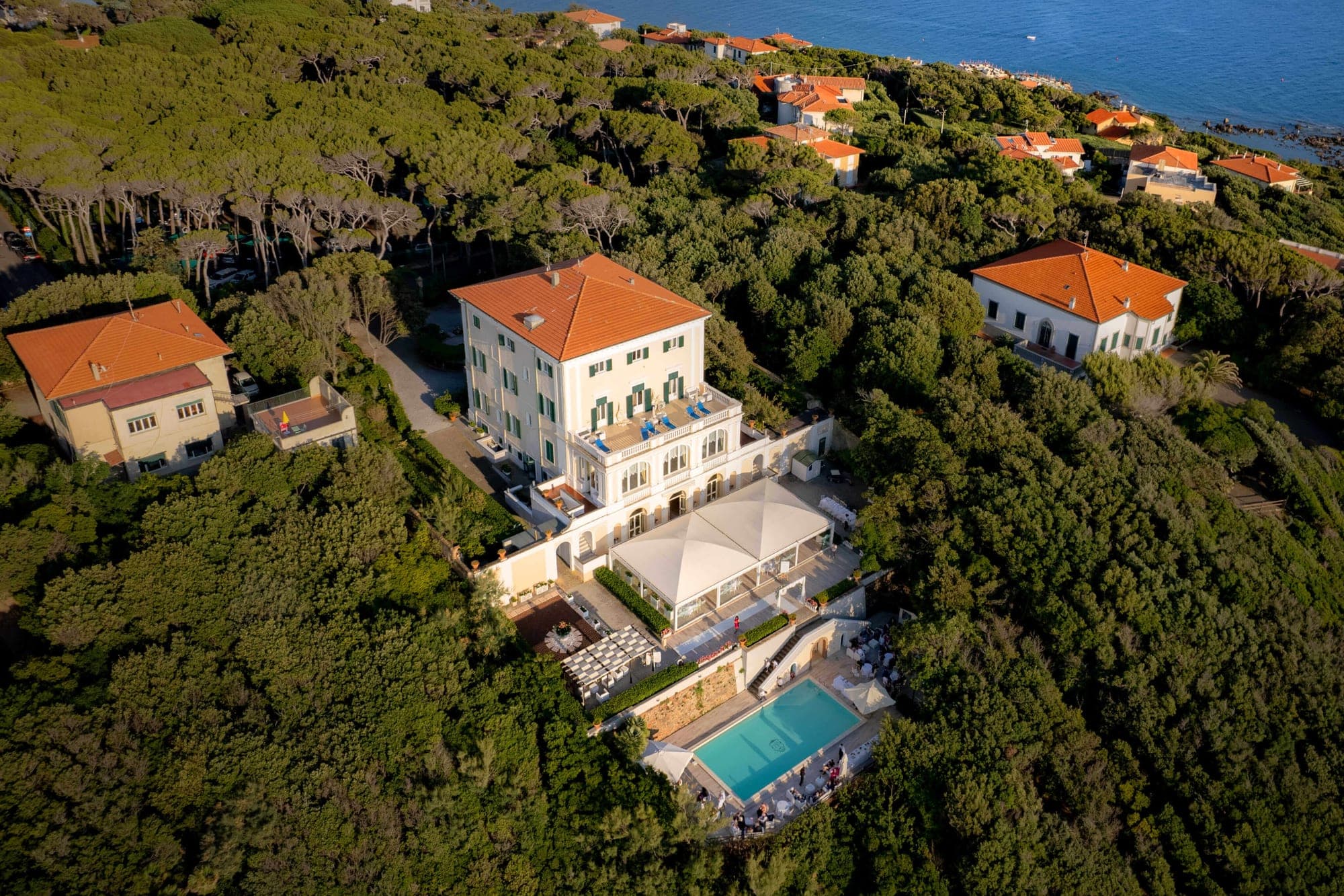 Aerial view of Grand Hotel Villa Parisi with pool and reception tent