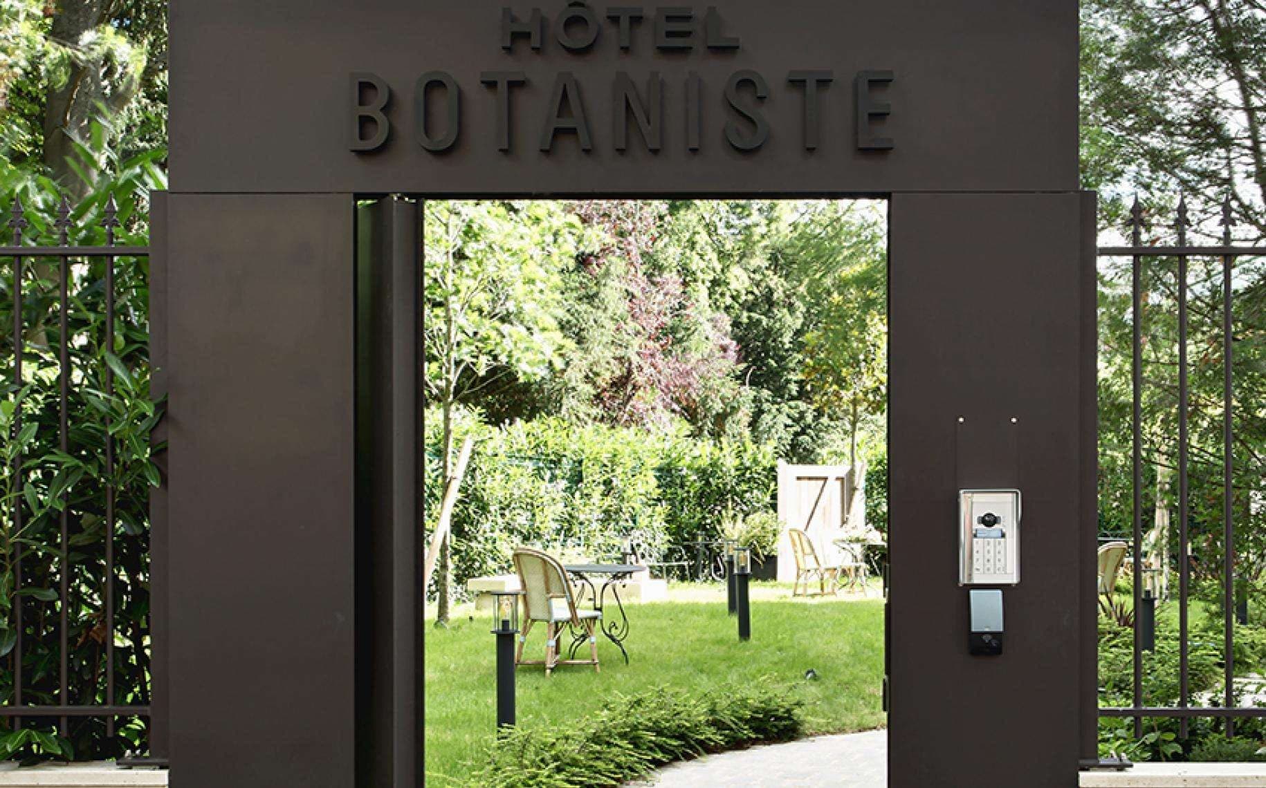Entrance to Hotel Botaniste with garden visible beyond