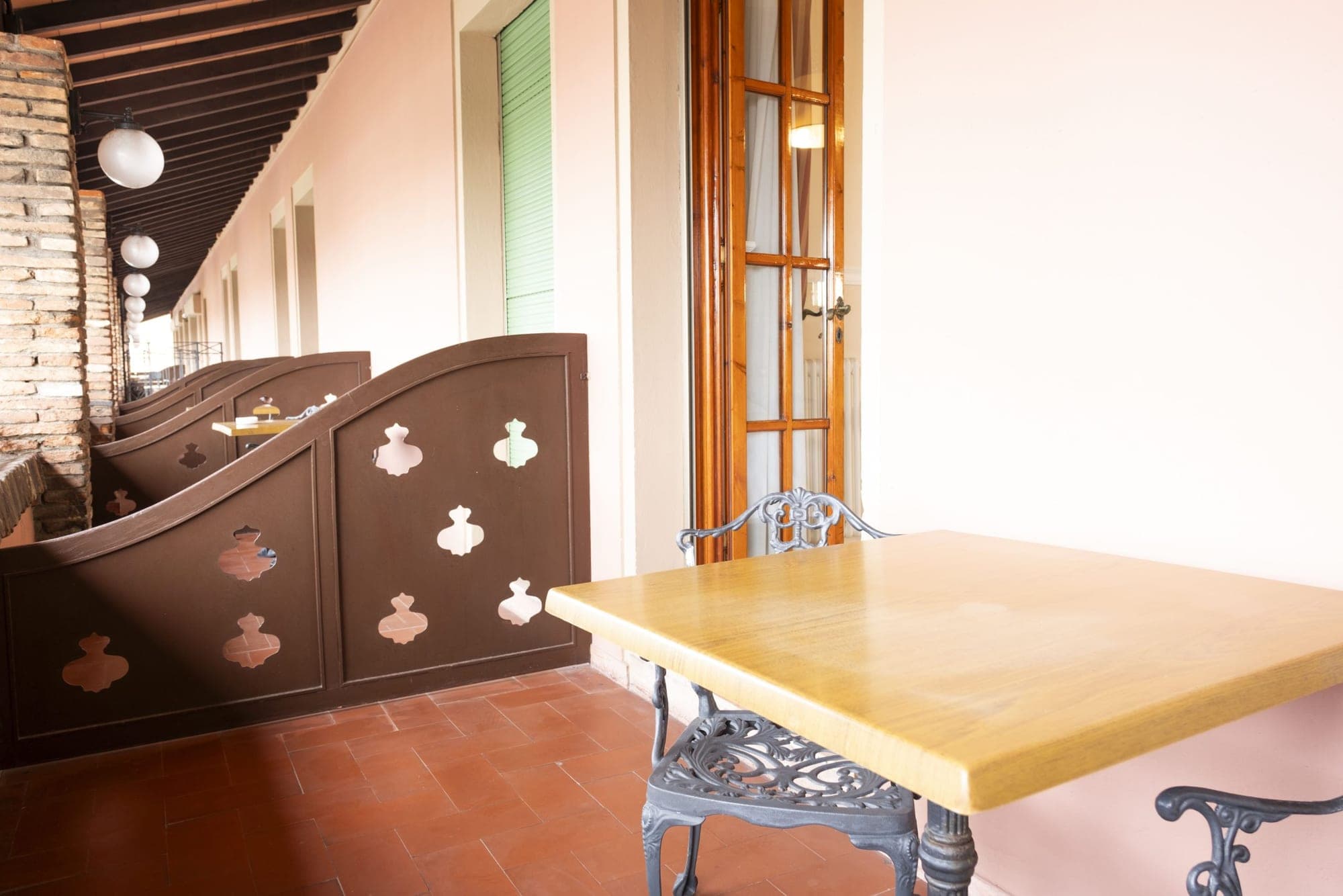 Outdoor seating area with tables and chairs
