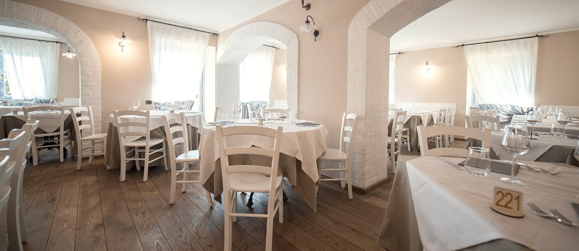 Dining room with tables set for a reception