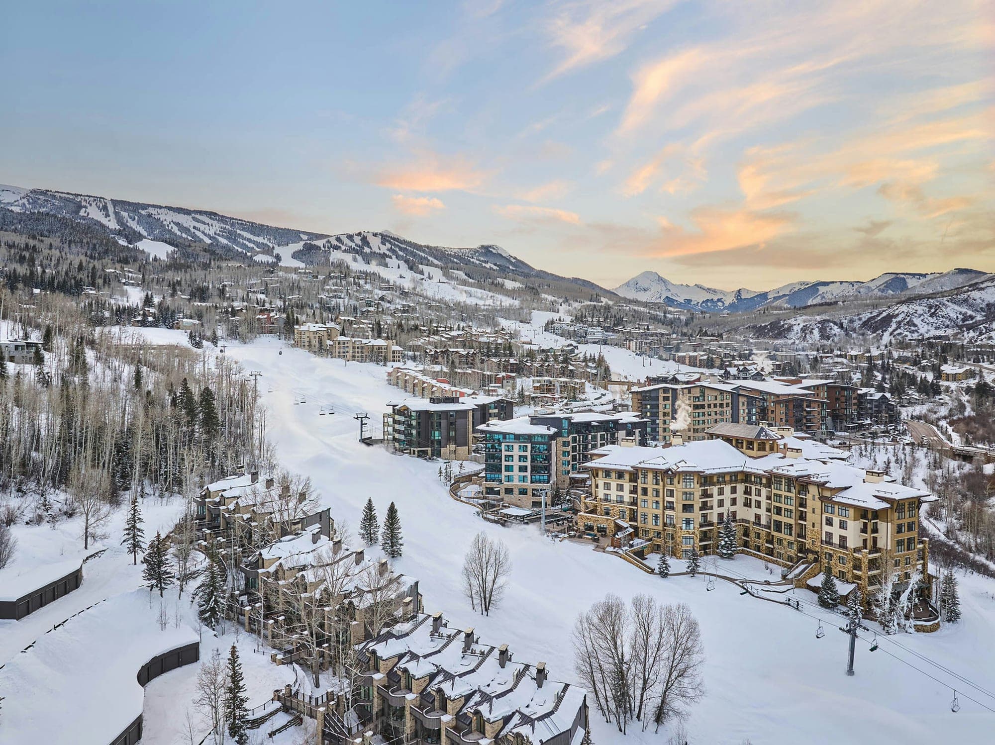Aerial view of Viceroy Snowmass resort and ski slopes in winter.