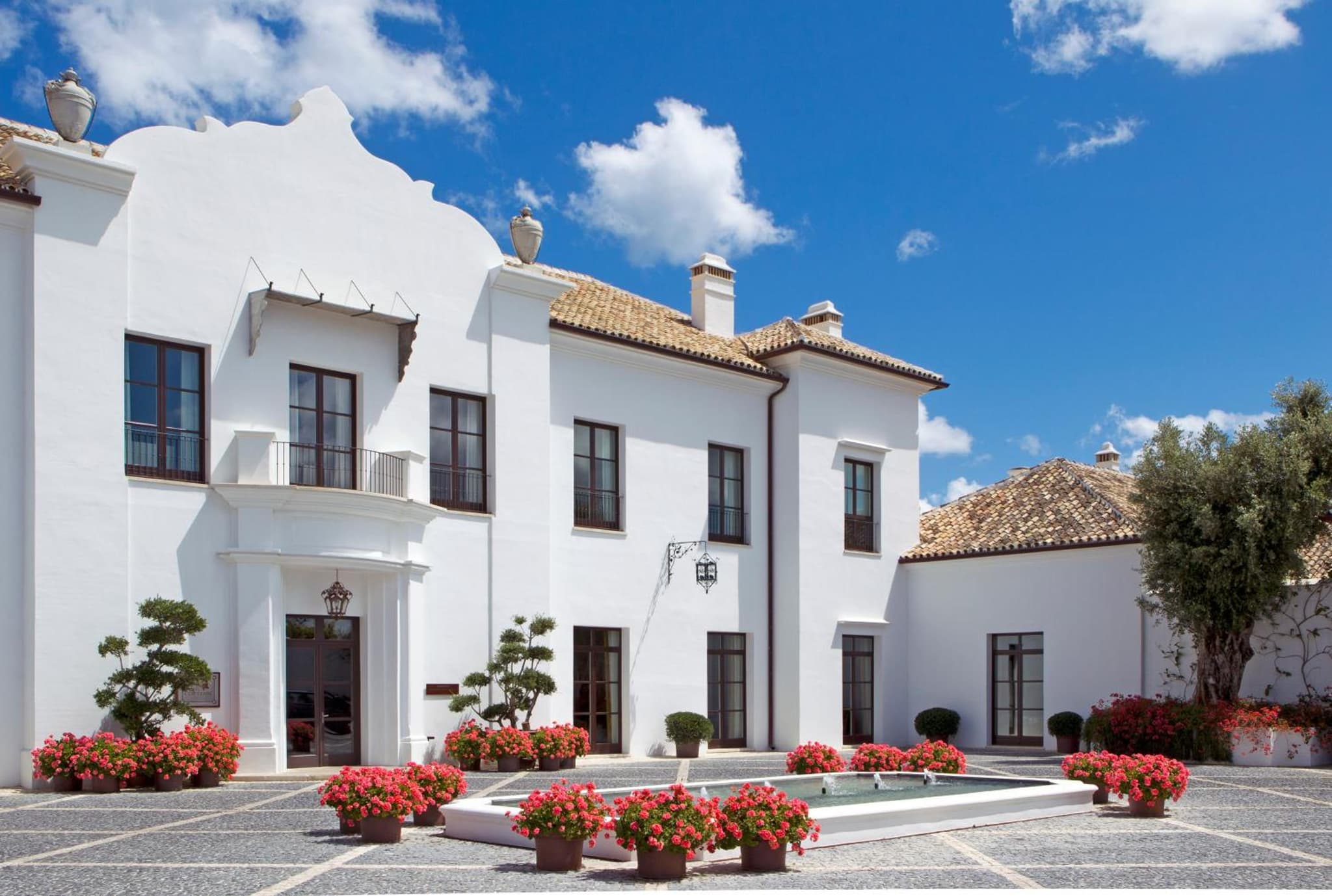 The Andalusian courtyard architecture and gardens of Finca Cortesin above Casares