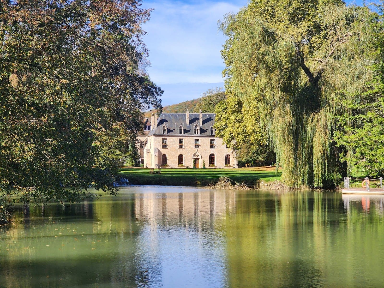 The stone abbey and gardens of Abbaye de la Bussière in the Burgundy countryside