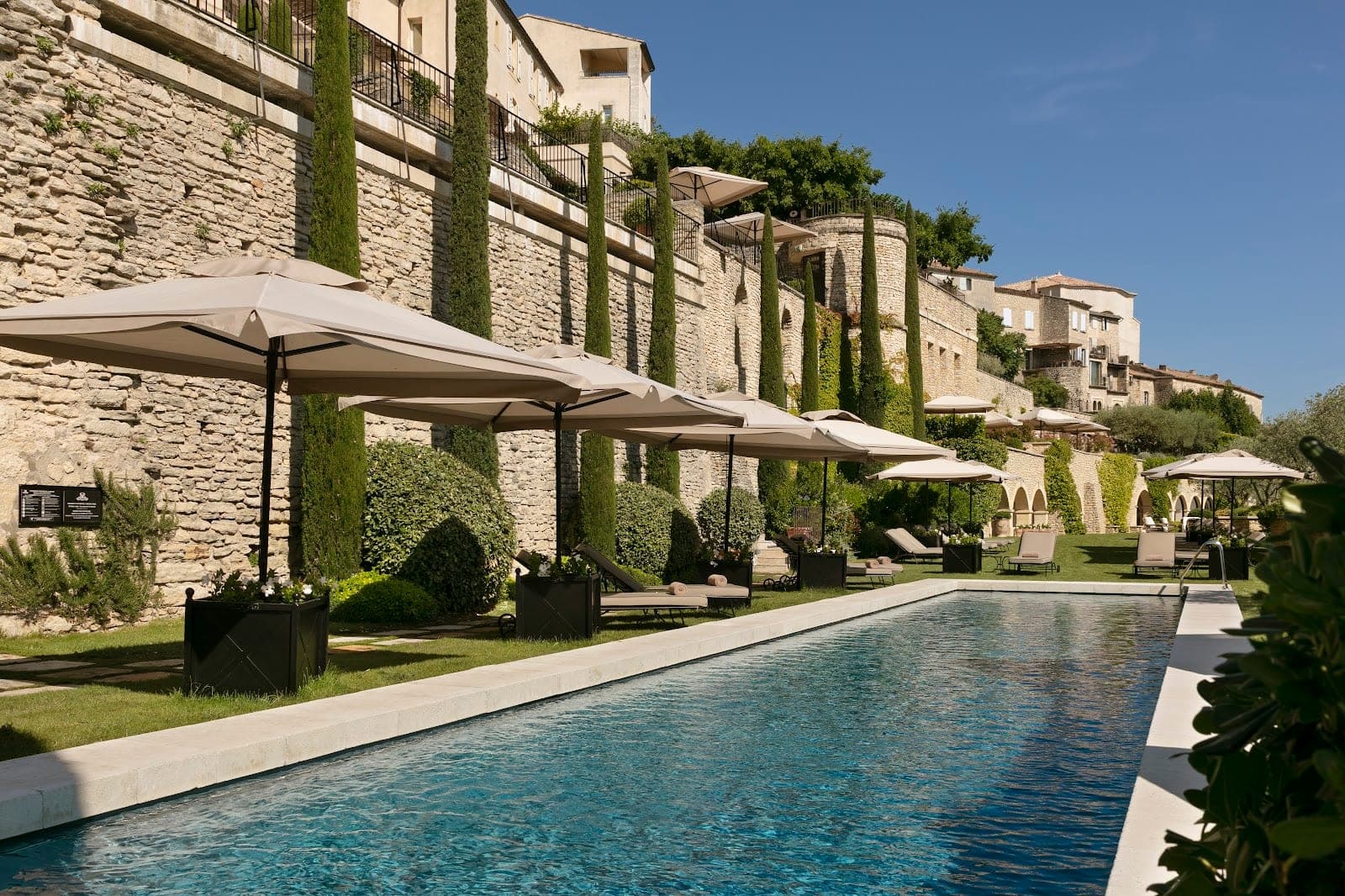 The terraces of La Bastide de Gordes stepping down the cliff above the Luberon valley