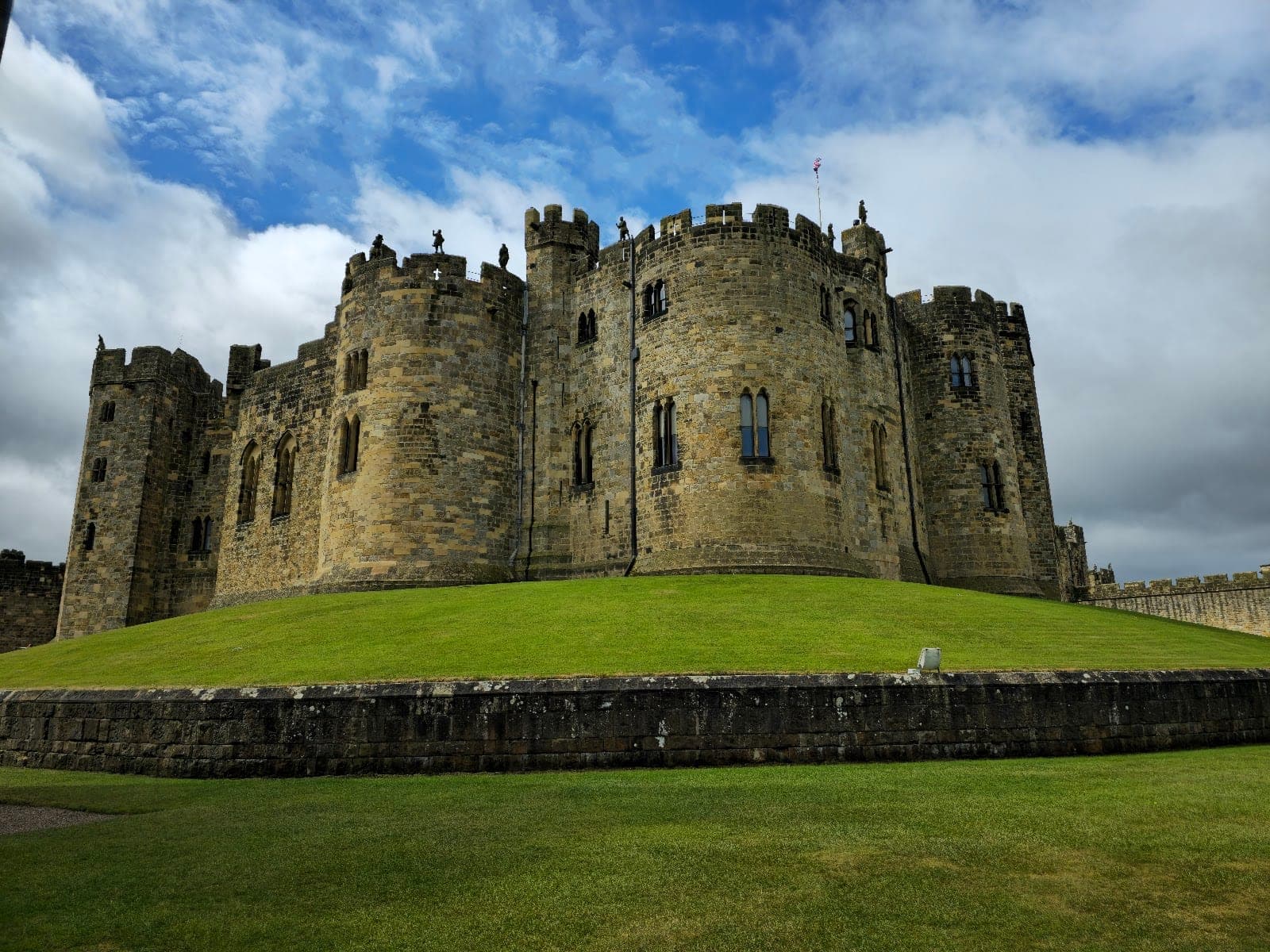 Alnwick Castle’s keep and battlements above the River Aln in Northumberland
