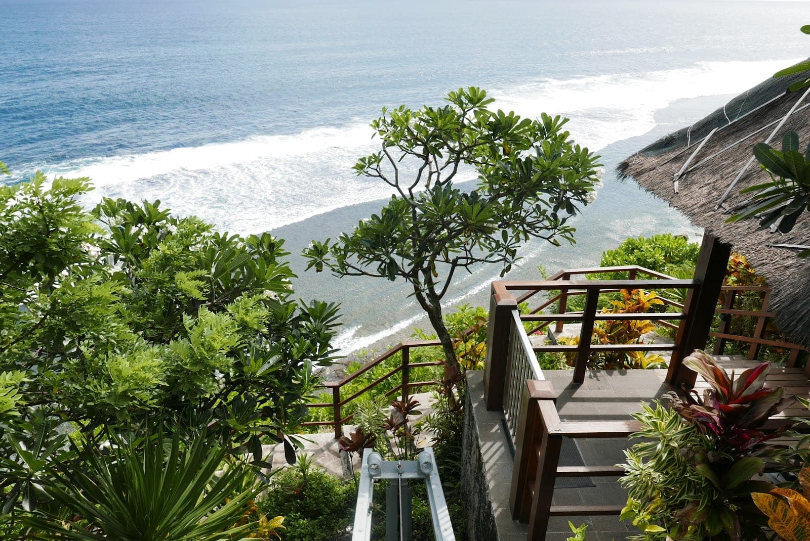 Stone villas, terraces and pools at Bvlgari Resort Bali, on the Pecatu clifftop above the Indian Ocean