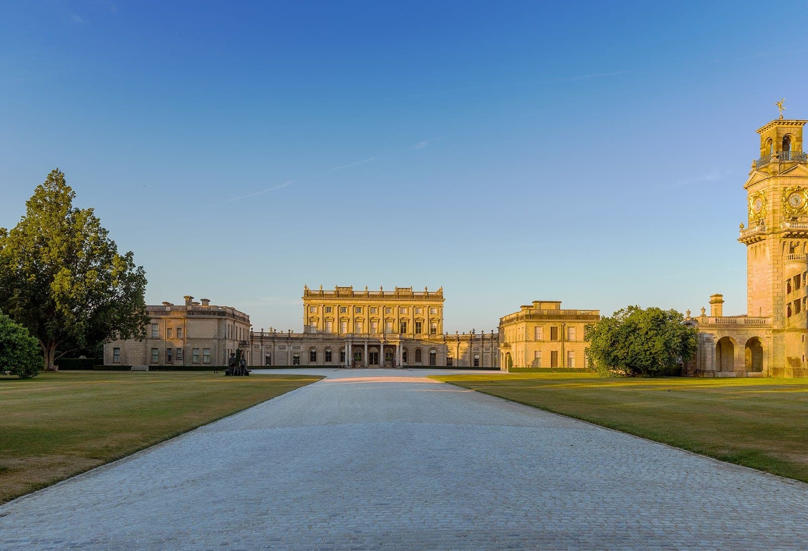 Cliveden House and its parterre gardens above the River Thames in Berkshire