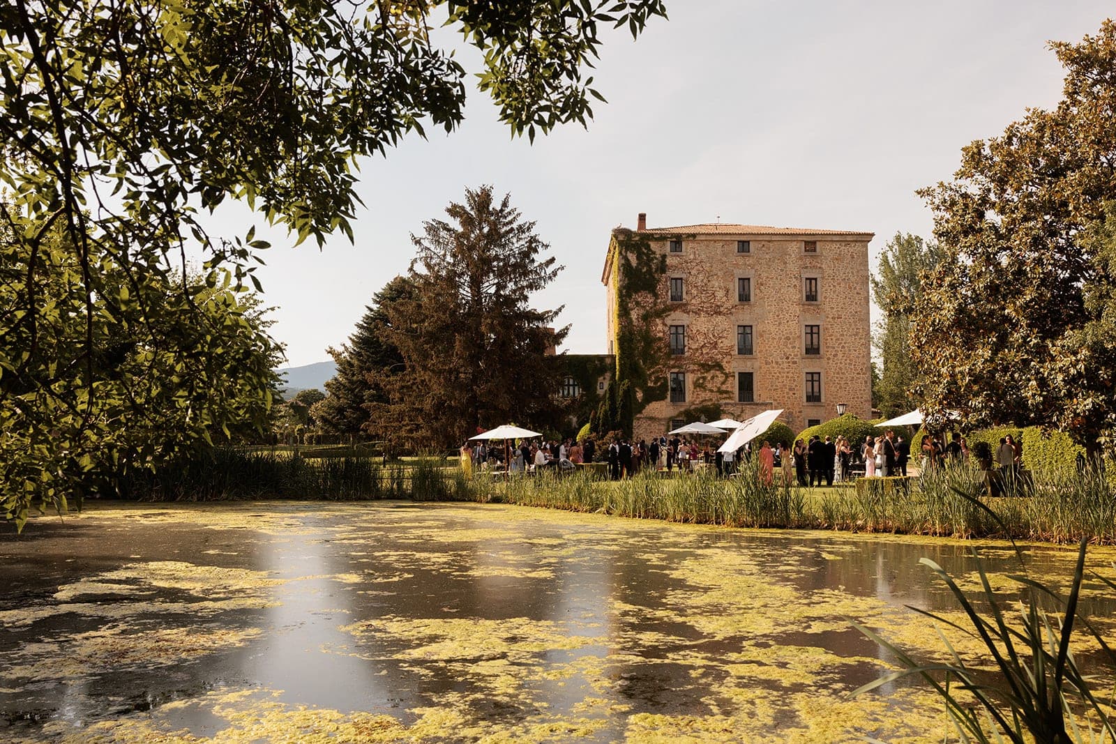 The granite fortified house and gardens of Finca El Campillo below El Escorial