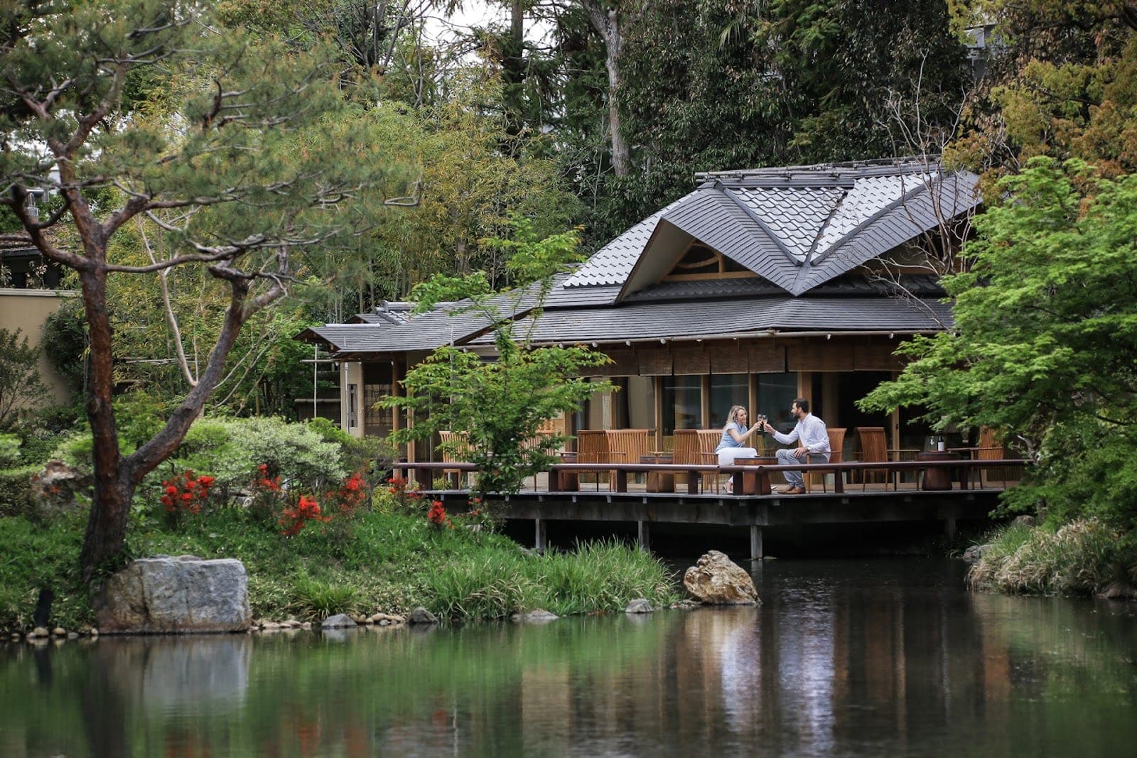 The Shakusui-en pond garden with Four Seasons Hotel Kyoto wrapped around it