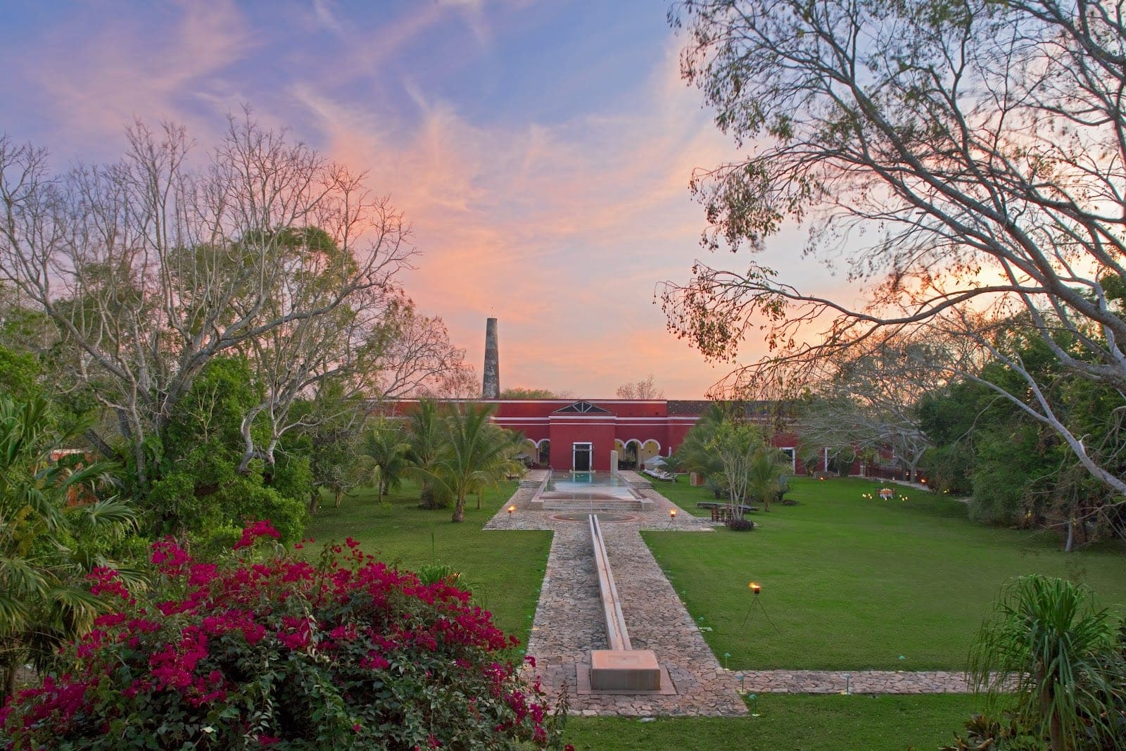 The ochre stone arcade and courtyard of Hacienda Temozón, a restored henequen estate south of Mérida