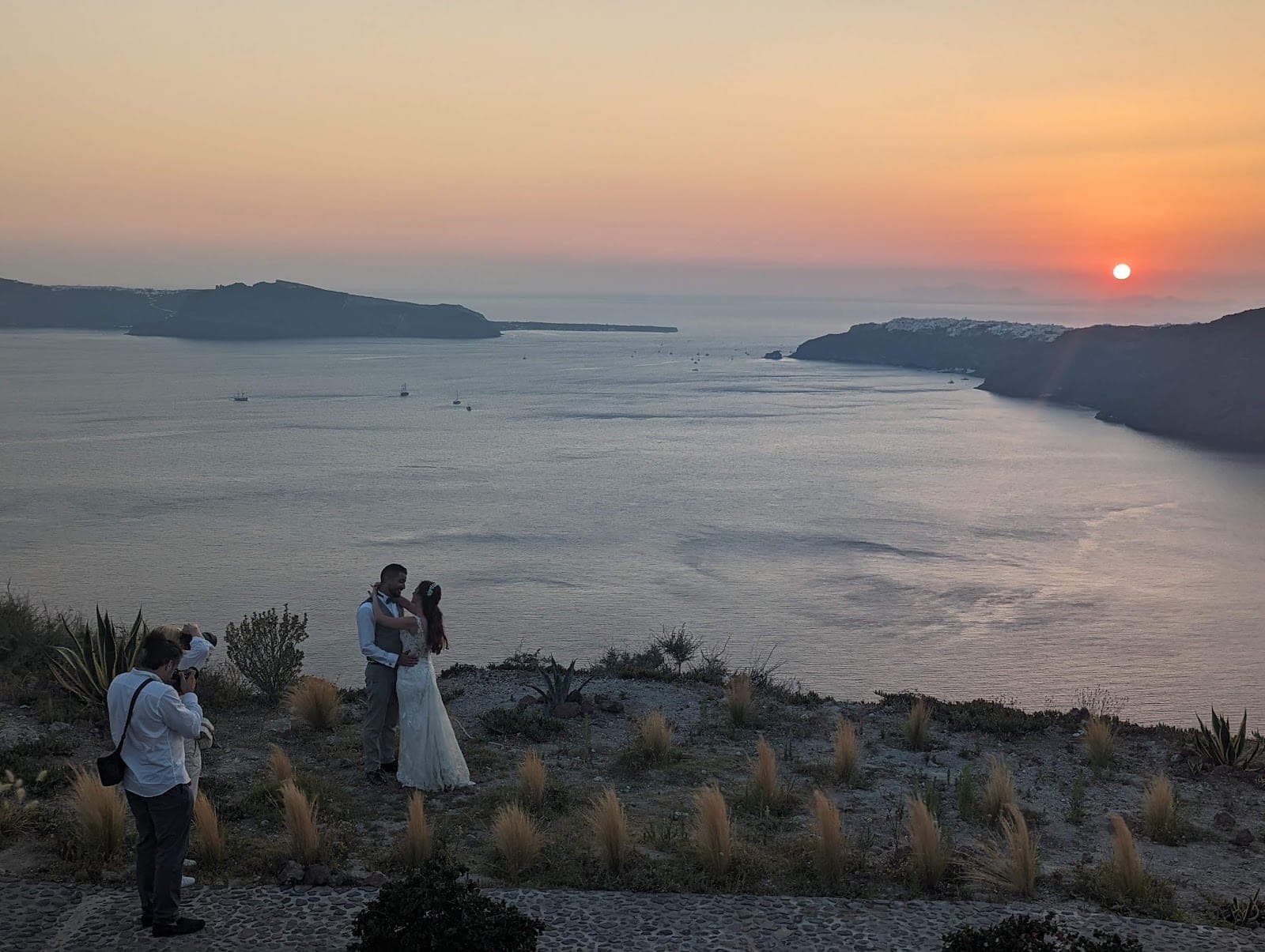 The caldera-facing ceremony terrace at Le Ciel in Imerovigli, Santorini
