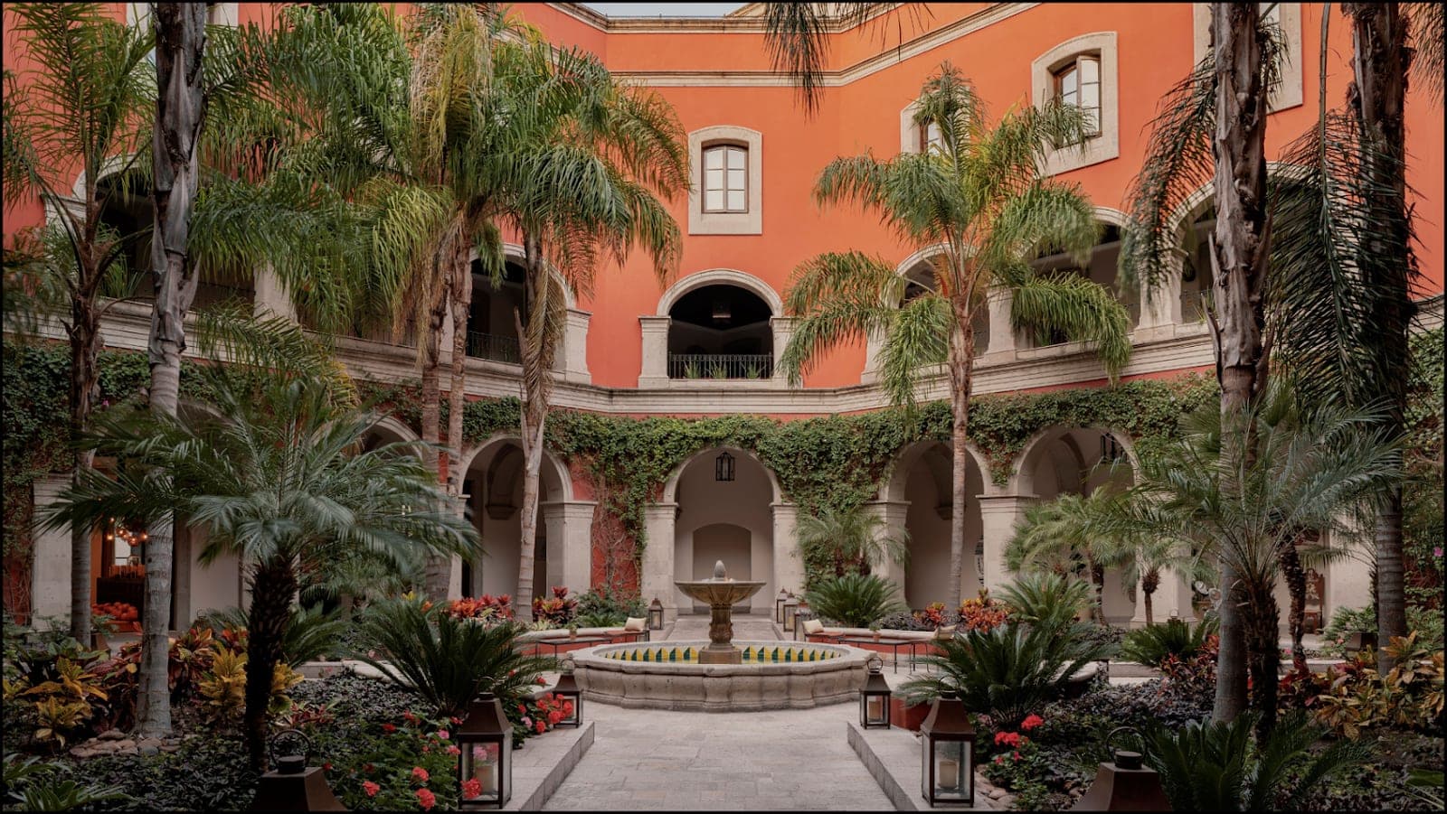 Rosewood San Miguel de Allende: the Luna rooftop terrace facing the pink spires of the Parroquia