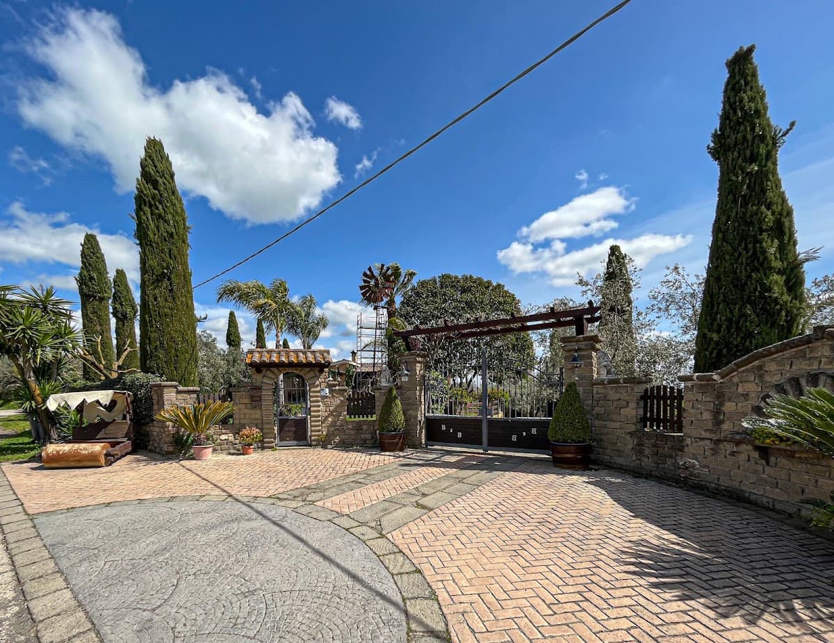 Il Giardino dei Flintstones B&B — destination wedding venue in 00052 Cerveteri RM, Italy