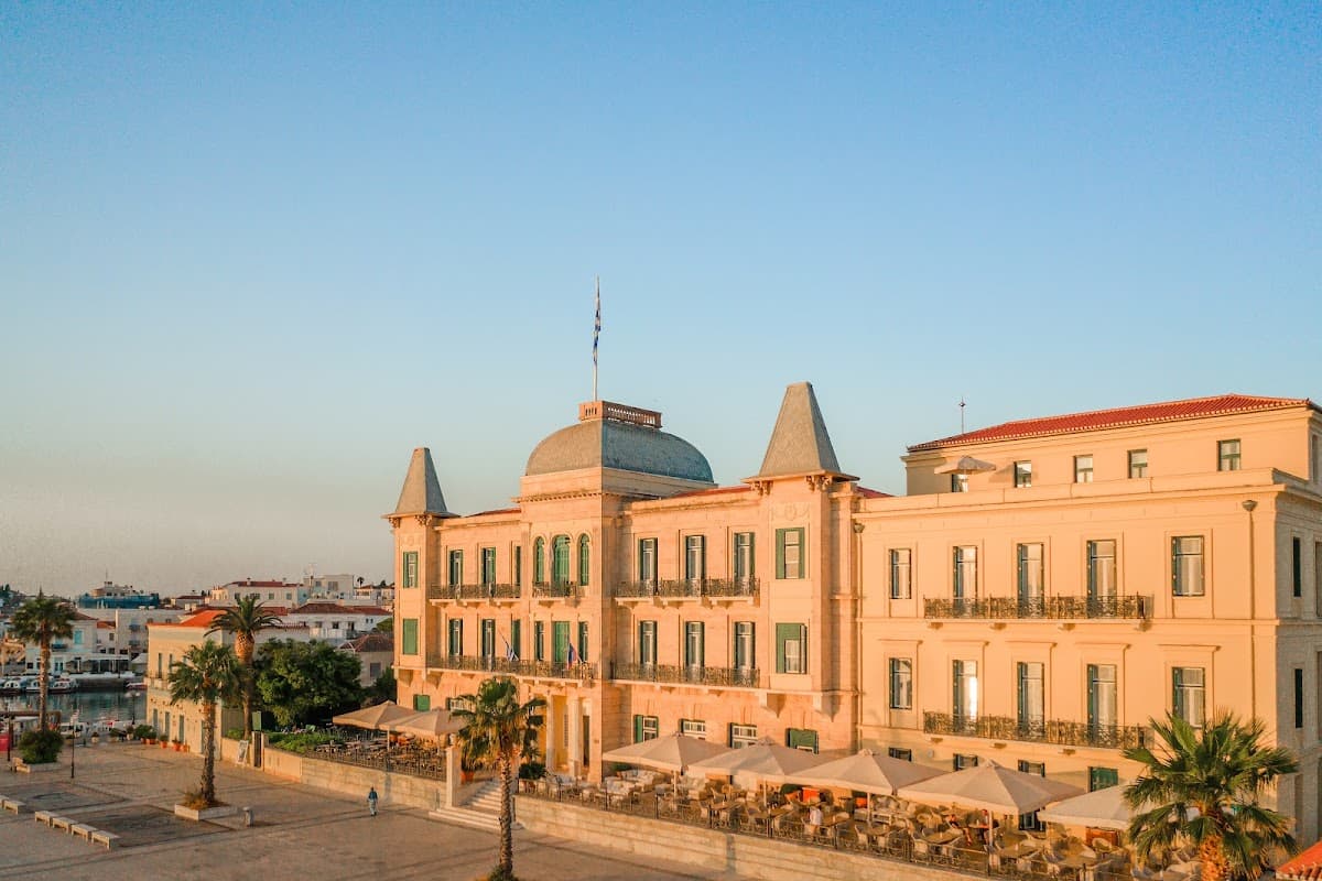 The Belle Époque façade of the Poseidonion Grand Hotel on the Dapia waterfront, Spetses